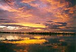 Sunrise in Maupiti (John Beck).